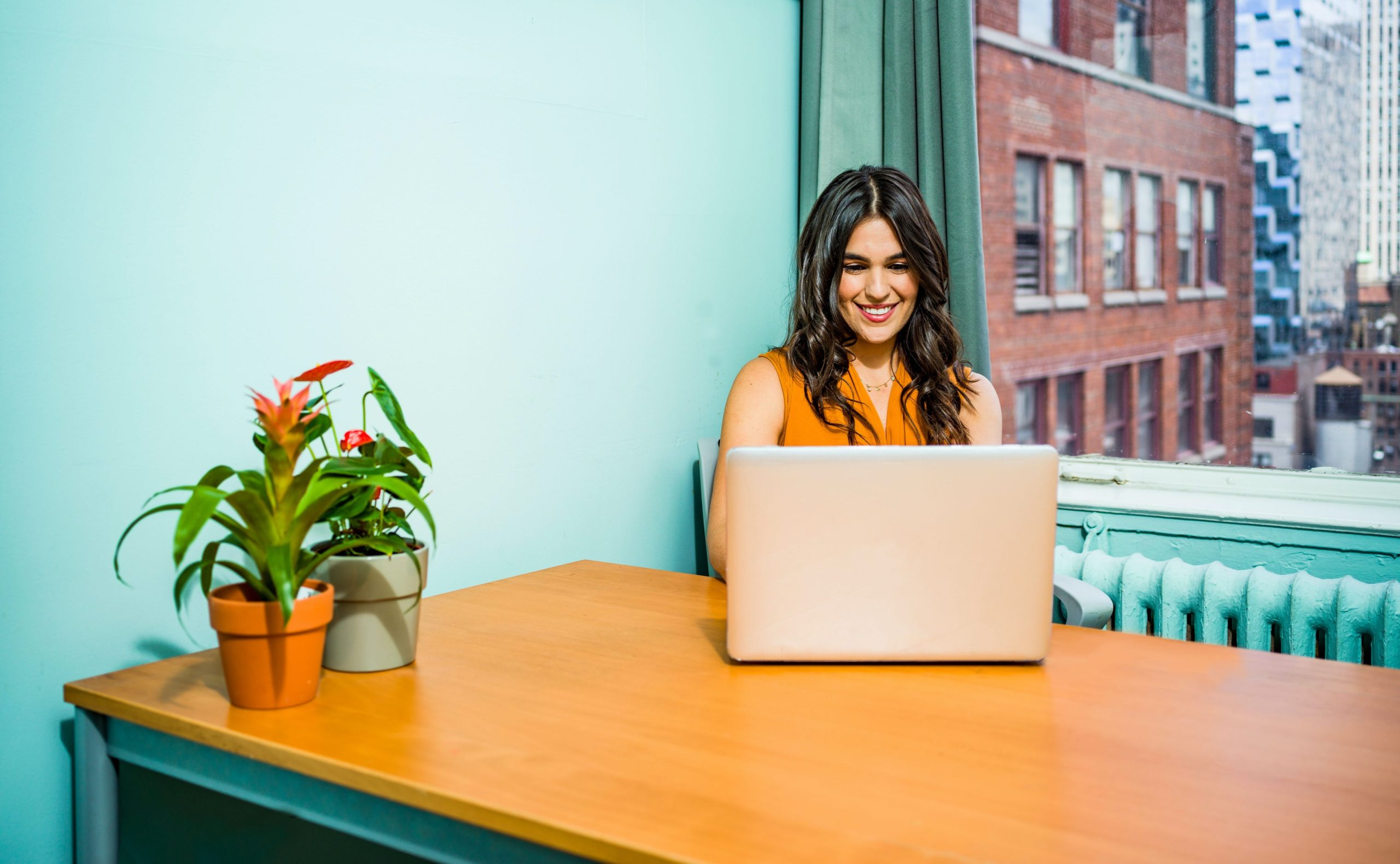 Employer sitting at desk
